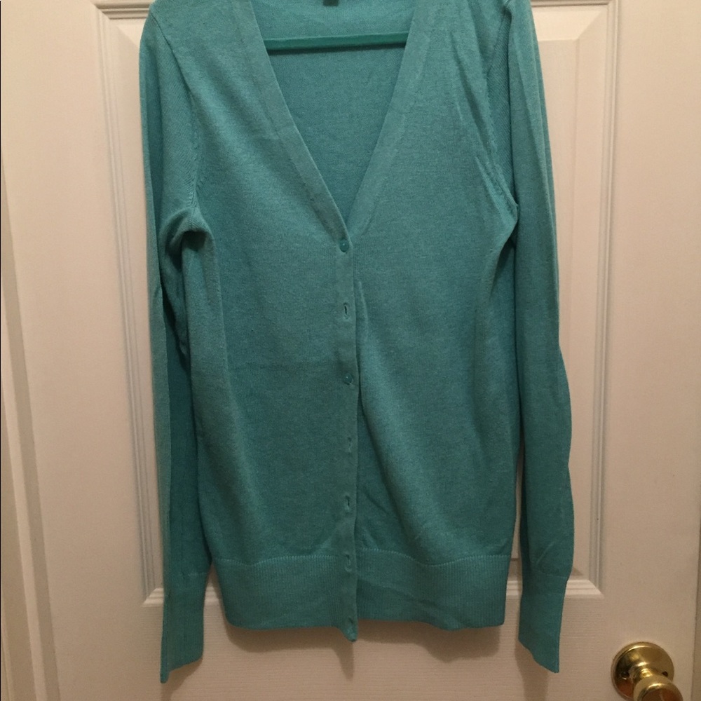 Women's soft teal cardigan sweater.